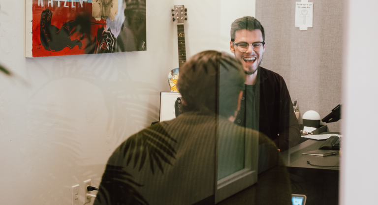 Marketing strategy discussion in a collaborative office.